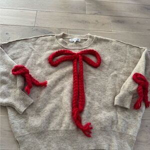 Beige Sweater with Red Accents